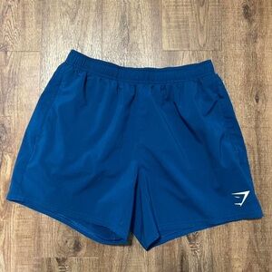 Gymshark blue Athletic Shorts zip up pockets